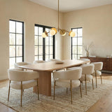 Mara 4 Globe Chandelier 48", Aged Brass globe Chandelier in a Contemporary Dining Room with an oak table and cream chairs.