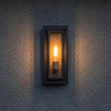 Jaxon Outdoor Wall Light, Matte Black with Brass Accents