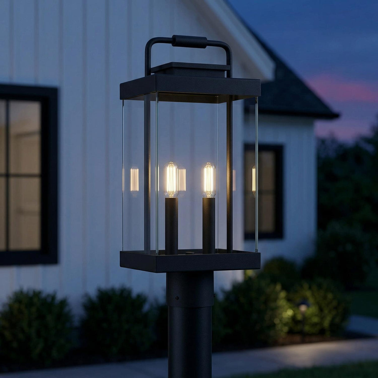 Parker Outdoor Post Light Matte Black geometric Outdoor Post in a Modern Farmhouse Outdoor with white board and batten siding.