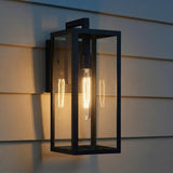 Sam Outdoor Wall Light, Medium 18" Matte Black geometric Outdoor Wall in a Modern Farmhouse Outdoor with beige siding.