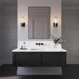 Lea Wall Sconce, Matte Black in a modern Bathroom