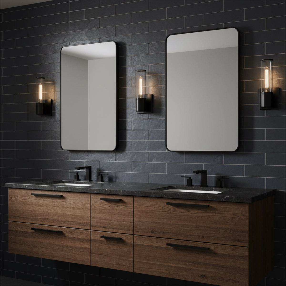 Lea Wall Sconce, Matte Black - Two wall sconces flanking mirrors over a wooden vanity with black countertops.