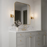 Lea Wall Sconce, Aged Brass in a transitional Bathroom