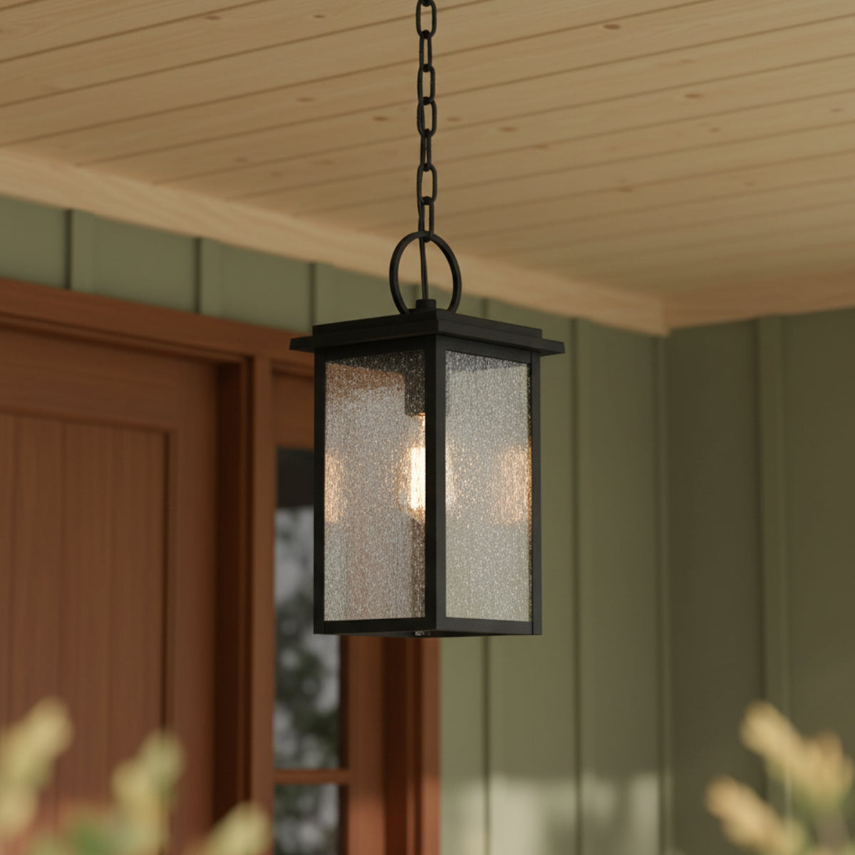 Paterson Outdoor Hanging Light for Craftsman home with Green Siding