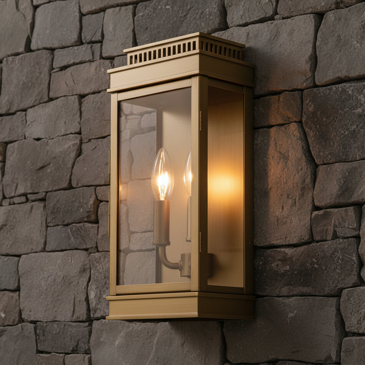 Brighton Outdoor Wall Light, Burnished Brass for Transitional home with Gray Stone