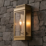 Brighton Outdoor Wall Light, Burnished Brass for Transitional home with Gray Stone