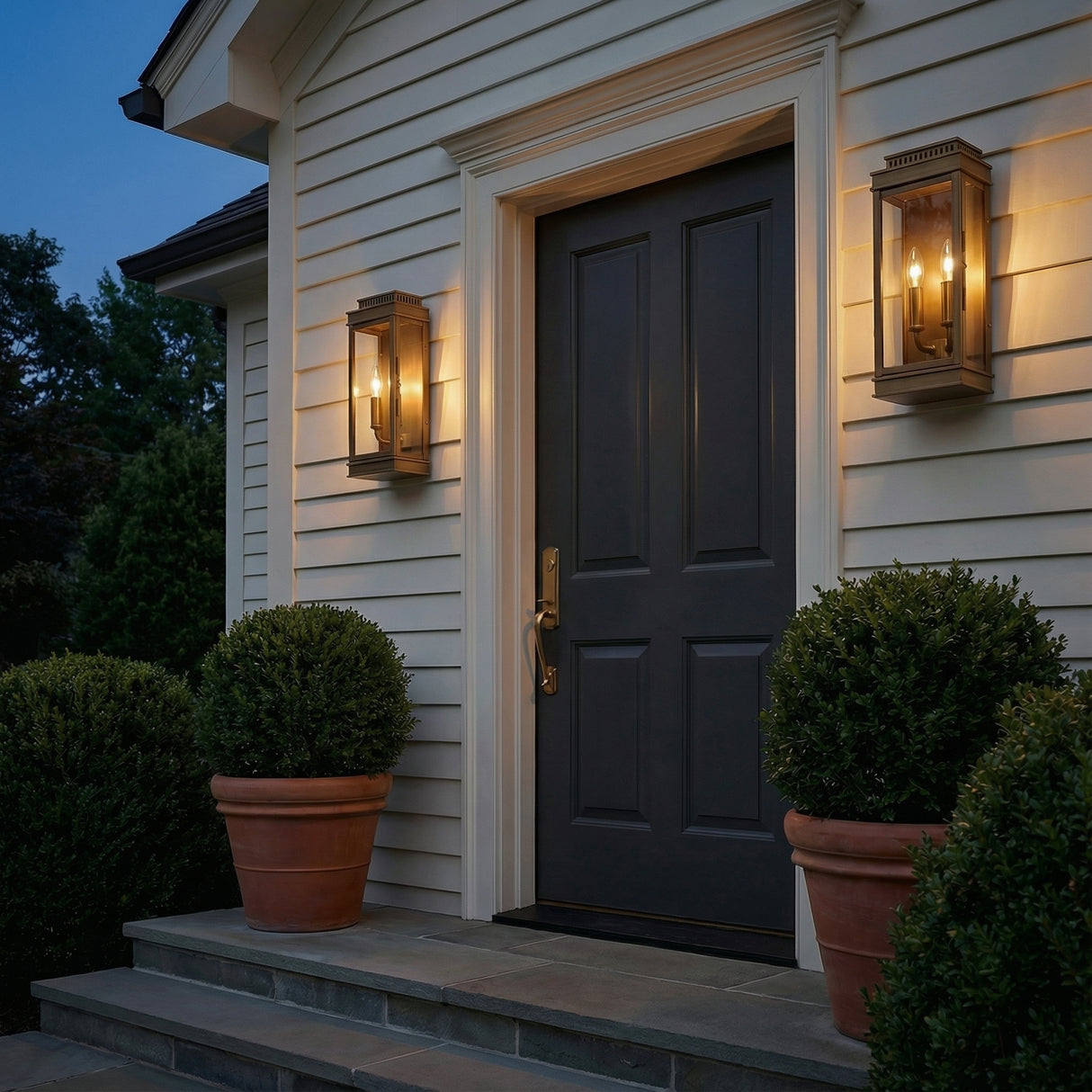 Brighton Outdoor Wall Light, Burnished Brass geometric Outdoor Wall Light in a Transitional Outdoor with terracotta planters & dark gray stone steps.