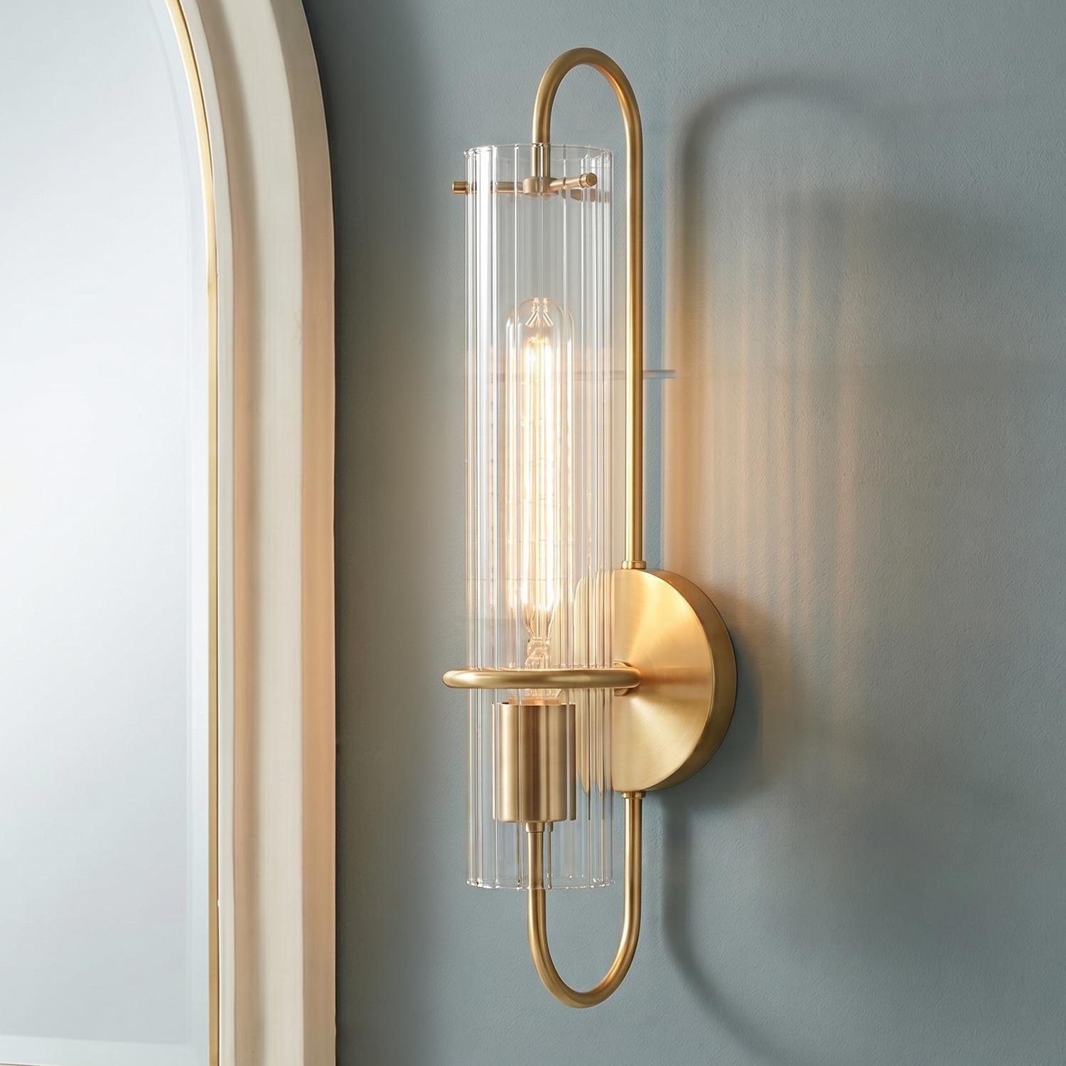 A modern bathroom featuring the Camie Wall Sconce 20