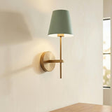 Banks Wall Sconce, Sage Green and Brass linear Wall Sconce in a Contemporary Entryway with a wooden console table.