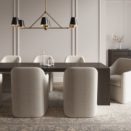 Banks Metal Linear Chandelier, with 6 lights and 46" wide, shown in Matte Black and Brass, is hung over a contemporary dark wood dining table, with seating for eight. 