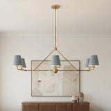 Banks 6 Light Linear Chandelier 46", French Blue and Brass geometric Chandelier in a Contemporary Living Room with a wooden slatted sideboard.