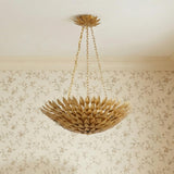 Alysa Pendant 24, Antique Gold in a Transitional Living Room with floral wallpaper.