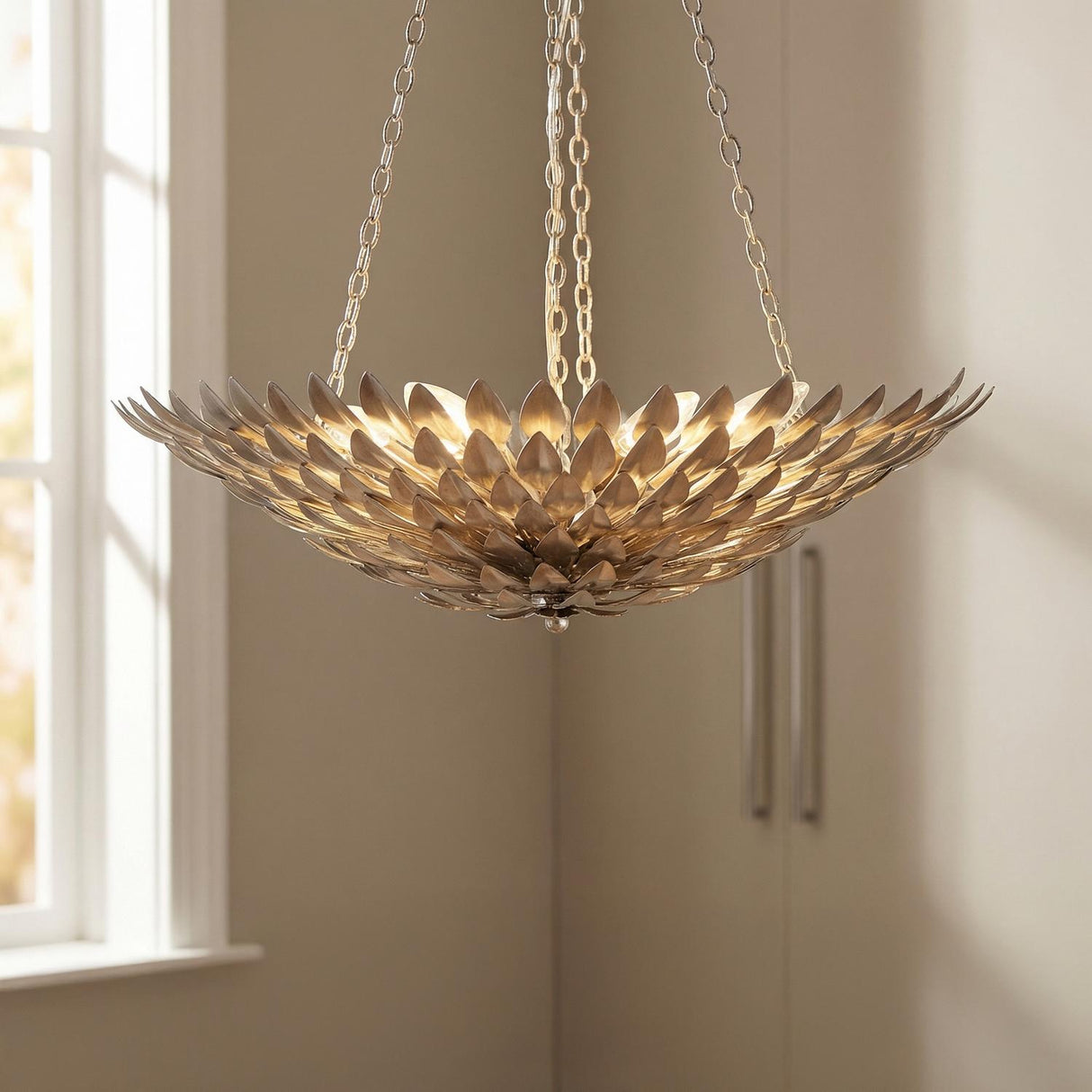 Alysa Pendant 24", Antique Silver leaf design Chandelier in a Transitional Bedroom with neutral walls and a tall window.