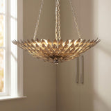 Alysa Pendant 24", Antique Silver leaf design Chandelier in a Transitional Bedroom with neutral walls and a tall window.