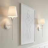 Alice Single Wall Sconce 21", Matte White leaf design Wall Sconce in a Contemporary Entryway with minimalist line art.
