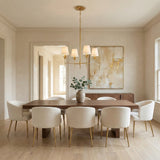 Alice 4 Light Chandelier 28", Antique Gold leaf design chandelier in a Contemporary Dining Room with a walnut table and cream chairs.