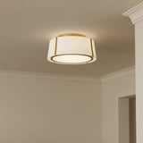 Hoyt Flush Mount 18" ceiling light, in Antique Gold finish with white fabric shade and opal glass diffuser.