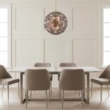 Layla Glass Pendant 22", Smoke - A dining room with a smoke glass pendant hanging above a marble table and six taupe chairs