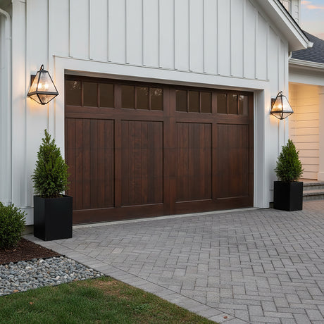 Emmett Outdoor Wall Light, Medium 17" Black Charcoal - Two outdoor sconces flank a wooden garage door.
