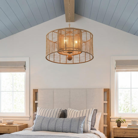 A coastal bedroom with the Sellah 4 Light Pendant 25", Jute and Satin Sand hanging along the ceiling center above a beige headboard and vaulted blue shiplap ceiling.