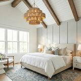 Sorelle 20 Light Chandelier 32", Jute and Soft Brass woven Chandelier in a Modern Farmhouse Bedroom with a linen bed and wood beams.