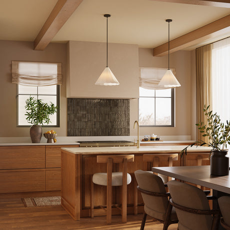 Modern kitchen with wooden cabinets, island, and two Reese Medium Pendant lights, 14" wide in Matte Black and Opal Glass.