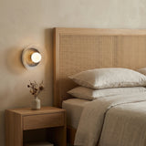 Ivan LED Wall Sconce, Matte Black for Modern home with Beige Walls