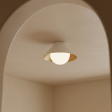 Juno Flush Mount 14", White and Opal Glass globe flush mount in a Contemporary Entryway with an arched hallway.