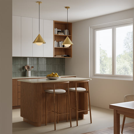Small modern kitchen design with two Juno 14" pendant lights in aged brass, hung above the two-seater island.
