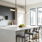 Blain LED Linear Pendant 48", Matte Black linear Pendant in a Modern Kitchen with a white quartz island.