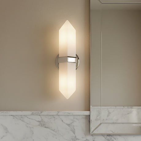 Modern Gracy 2 Light Wall Sconce, Polished Nickel and Alabaster shade next to a vanity mirror with a marble backsplash. 