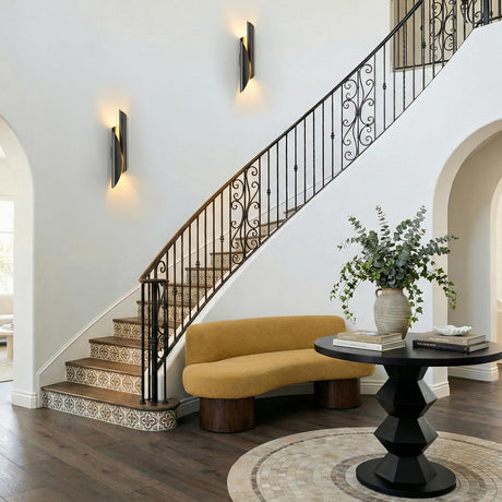 Isla Wrapped Wall Sconce 26", Urban Bronze with Brushed Gold wrapped design Wall Sconce in a Mediterranean Entryway with patterned tile stairs.