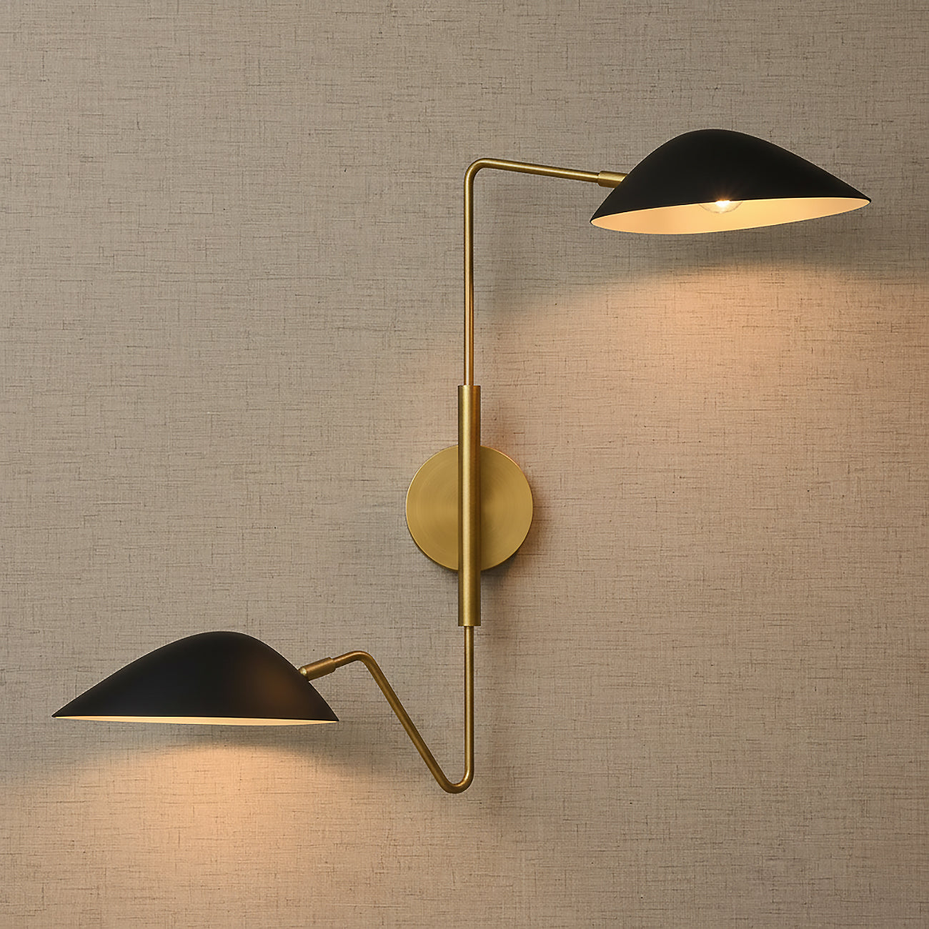 Jade Double Swing Arm Sconce, Matte Black and Antique Brass for Modern home with Beige Textured Wallpaper