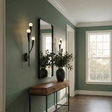 Anita Wall Sconce 24", Antique Iron globe Wall Sconce in a Transitional Entryway with a wooden console table and black mirror.
