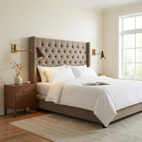 Ralph Swing Arm Wall Sconce, Vintage Brass with Bronze geometric Wall Sconce in a Transitional Bedroom with a tufted headboard.