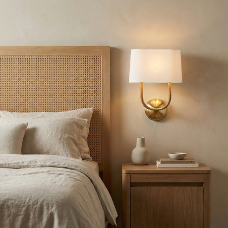 Iris Wall Sconce, Aged Brass with Rattan for Modern home with Beige Walls