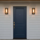 Wesley Outdoor Wall Light, Medium 17" Bronze with Vintage Brass Accents - Two wall sconces flanking a navy blue front door