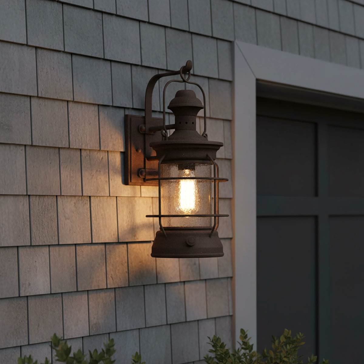 Edgar Outdoor Wall Light for Coastal home with Gray Siding