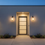 Rogers Outdoor Wall Light, 18" Bronze - Front entrance of a modern home with wall sconces.