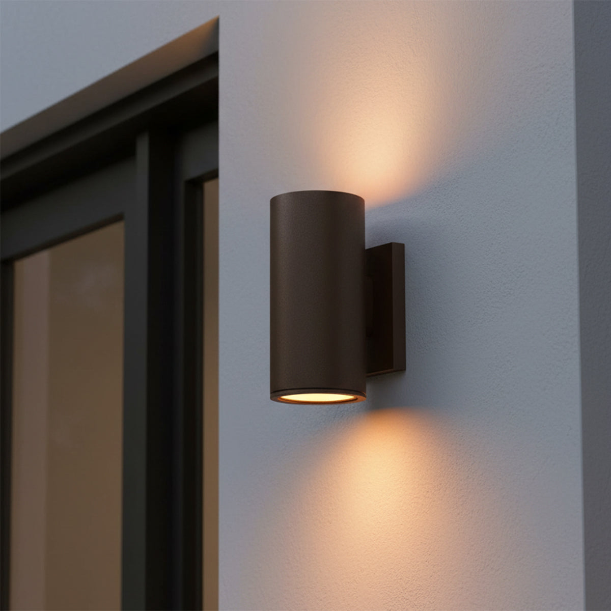 Beck Outdoor Cylinder Wall Light, 9" Bronze for Modern home with Gray Siding