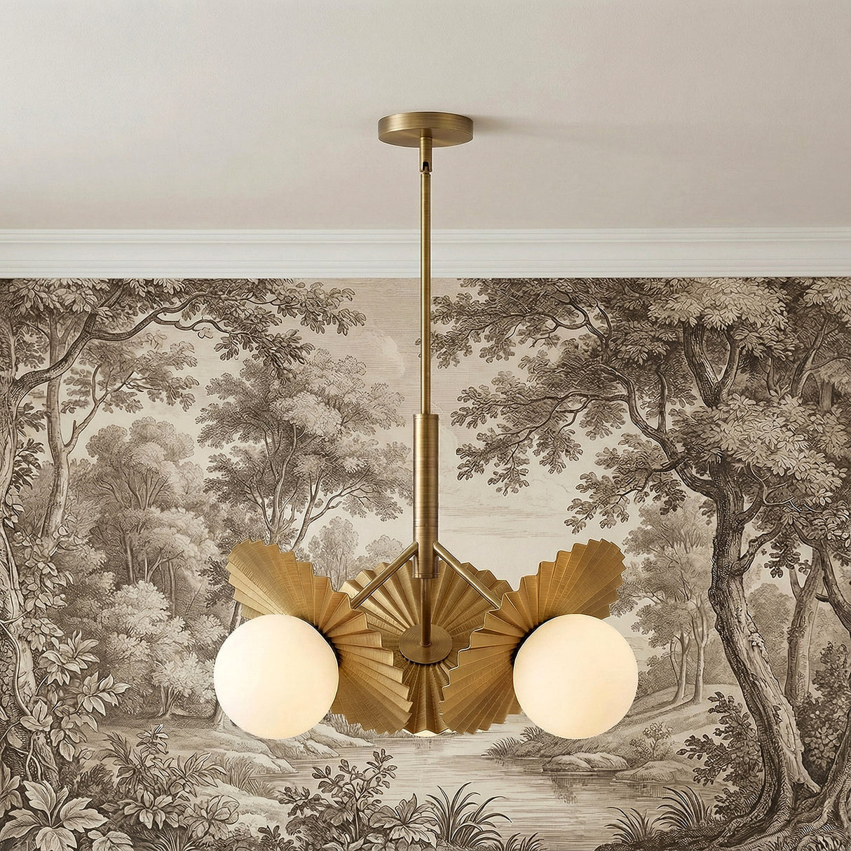 Lydia 3 Light Pendant 21", Brushed Brass and Opal Glass scalloped Chandelier in a Transitional Living Room with scenic toile wallpaper.