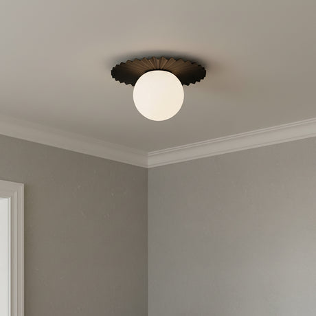 Lydia Flush Mount 14", Black and Opal Glass - A black and opal glass flush mount ceiling light is centered on a white ceiling, in a room with gray walls.