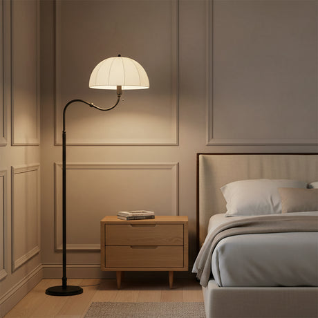 Trudy Floor Lamp, Matte Black - Matte black floor lamp next to nightstand