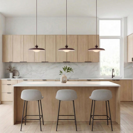 Mabel Metal Pendant 15", Maroon with Opal Glass geometric pendant in a Modern Kitchen with a white marble island and light wood cabinets.