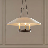 Dawson Pendant 25", Bronze with Linen Shade woven pendant in a Transitional Dining Room with a classic paneled wall.