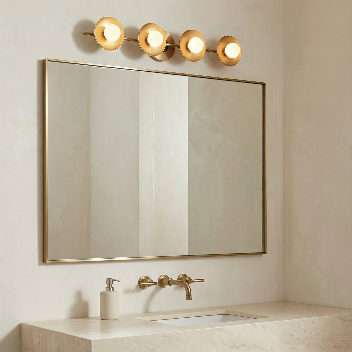 Liam 4 Light Vanity, Aged Brass in a Contemporary bathroom with marble vanity