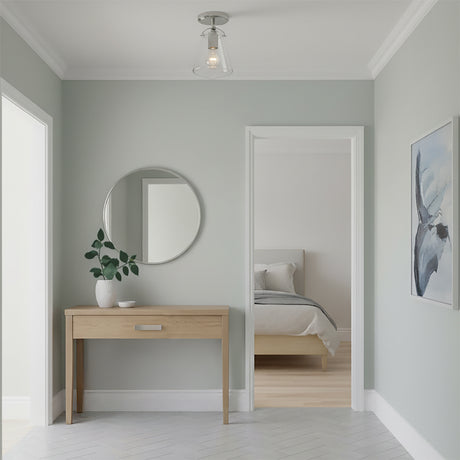 Addison Semi-Flush 6, Polished Nickel - A hallway with a console table, a round mirror, and a glimpse into a bedroom.