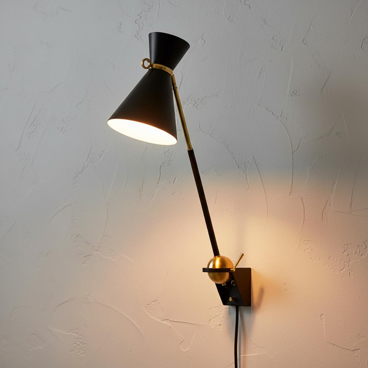 Jerry Adjustable Plug-in Wall Sconce, Black with Brass Accents