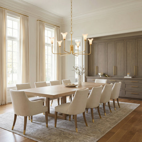 Dahlia 6 Light Chandelier 40", Gold Leaf scalloped chandelier in a Transitional Dining Room with a light wood dining table and upholstered chairs.