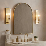 Mercer Wall Sconce 14", Aged Brass linear Wall Sconce in a Transitional Bathroom with an arched mirror & marble vanity.